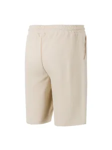 Back view detail of casual waffle knit shorts in light khaki color with elastic waist.