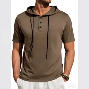 Detail view of men's short sleeve hooded t-shirt featuring button placket and drawstrings.
