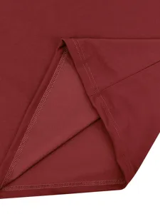 Close-up detail of dark red men's athletic apparel fabric and neat stitching craftsmanship.