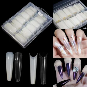 Detailed view of false nail tips in a storage box, showing shapes and manicure results.