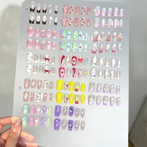 Set di unghie finte fatte a mano con effetto occhio di gatto, fiocchi carini e design colorati.