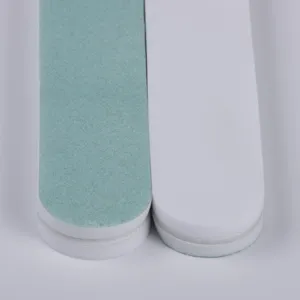 Professional double-sided nail file and buffer block for manicure shaping and polishing detailing.