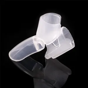 Transparent plastic nail protector clip detail, professional manicure tool for easy removal.