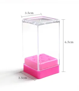 Clear plastic nail drill bit storage box detail, compact acrylic organizer with pink base.