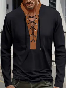 Detail view of men's black waffle knit long sleeve shirt with brown lace up color block collar.