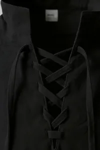 Men's retro casual lace-up henley shirt detail view, showing black collar and cross ties.