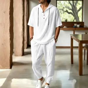 Detail view of the breathable white linen casual summer resort hooded shirt and pants set.