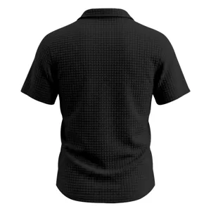 Men's black waffle textured short sleeve polo shirt detail view, casual summer top.