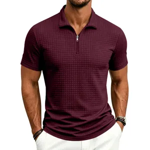 Close-up of men's waffle knit short sleeve polo shirt with quarter zip in burgundy style.