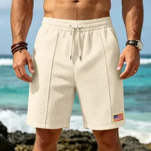 Men's waffle knit casual shorts summer beach drawstring sports five-point pants with flag patch