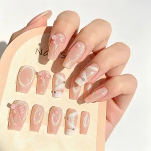 Unghie finte fatte a mano con effetto occhio di gatto, fiocchi 3D e strass per donne.