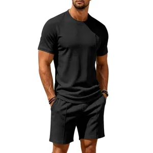Detail view of the black waffle knit short sleeve t-shirt and matching shorts for men.