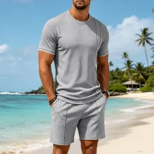 Men's waffle knit short sleeve t-shirt and shorts set, casual summer beach outfit detail.