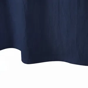 Close-up detail of dark blue men casual shirt fabric hem, showing fine texture and stitching.