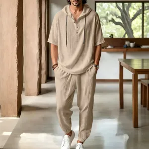 Men's casual linen hooded short sleeve shirt and long pants set, comfortable beach wear detail.