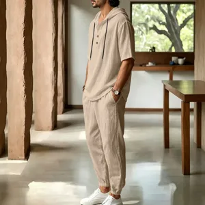 Men casual linen hooded short sleeve shirt and long pants set for beach summer vacation.