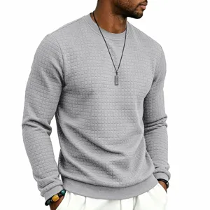 Mens grey waffle knit crewneck sweater detail showcasing textured fabric and long sleeves.