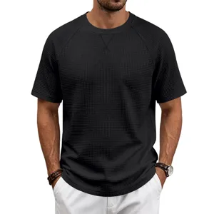 Detailed view of the black waffle knit short sleeve t-shirt, showing texture and breathable fit.