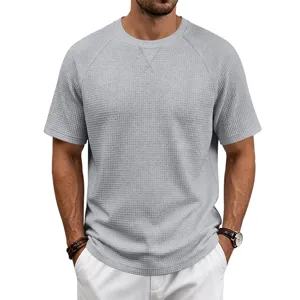 Casual waffle knit short sleeve t-shirt detail showing textured fabric and regular fit design.