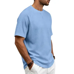 Men's waffle knit short sleeve t-shirt, casual solid color crew neck breathable top detail.