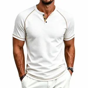 Close-up of men's summer waffle knit short sleeve Henley shirt with contrast raglan stitching.