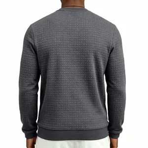 Men's dark grey waffle knit long sleeve crewneck sweatshirt back texture close-up.