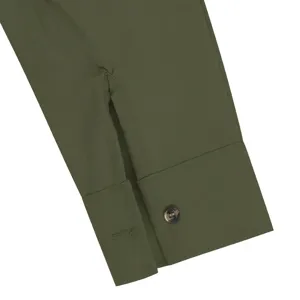 Men's long sleeve shirt green cuff detail close up view, classic button casual top.