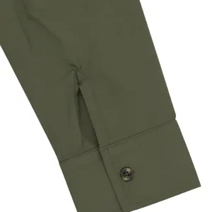 Detailed close-up of men's casual long sleeve shirt cuff with button and neat stitching.