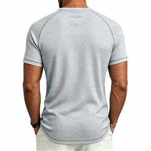 Men's waffle knit raglan short sleeve t-shirt detail showing contrast stitching and texture.