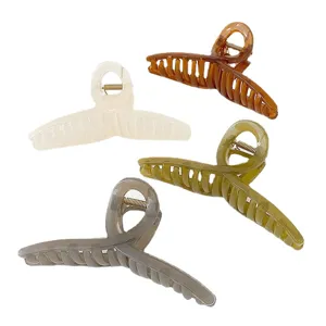 Set of 4 large translucent jelly color cross hair claws shark clips for women styling.