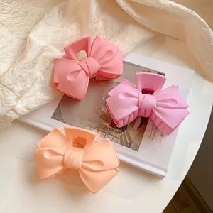 Matte bow hair claw clip set, sweet pink and orange hair accessories for women and girls.