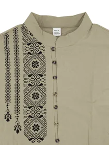 Close-up detail of mens mandarin collar linen blend shirt with ethnic print and buttons.