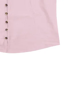 Close-up detail of men's casual long sleeve shirt button placket and hem in pink.