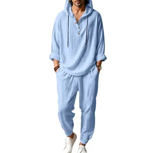 Detail view of men casual linen hooded two piece set in light blue color breathable fabric.