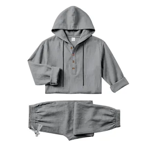 Close-up detail of the breathable gray linen men's hooded short sleeve set with buttons.