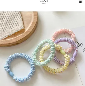 Accessori per capelli coreani a pois con perline, elastici in tessuto morbidi.