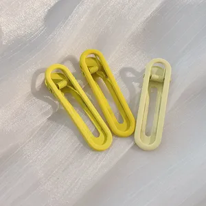 Candy color geometric duckbill hair clip detail, sweet side bangs hairpin accessory.