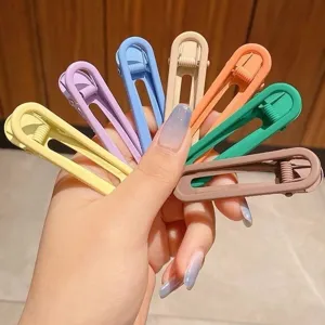 Candy color seamless hair clips sweet geometric duckbill clips for cute daily styling.