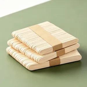 Detailed view of natural wooden craft sticks neatly stacked with brown paper bands for DIY models.