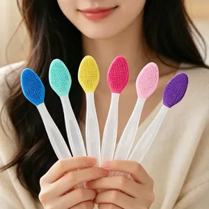 Double-sided silicone facial cleansing brush, portable colored nose cleaner for daily skincare.
