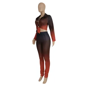 Detail view of women gradient long sleeve crop top and pants set, stylish casual wear.