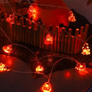 Guirnalda de luces LED de Halloween con calabazas calaveras, ideal para decoración de fiestas.