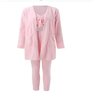 Pink fuzzy 3-piece loungewear set detail showing soft cardigan, camisole and pants.