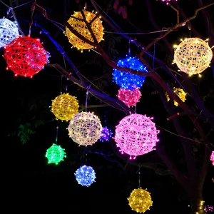 Colorful LED rattan ball lights for outdoor holiday decoration, waterproof hanging tree lamps.