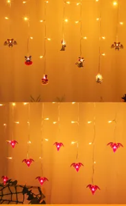 Halloween LED string lights featuring cute bats, ghosts, and pumpkins for party decor.