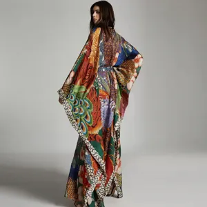 Detailed view of women's vibrant floral print kimono cardigans with long sleeves and elegant flow.