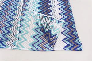 Colorful zig-zag crochet beach cover-up cardigan, perfect for summer vacation and swimwear.