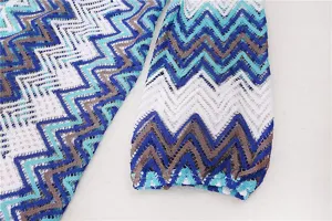 Colorful zig-zag crochet beach cover-up sleeve detail, perfect for summer vacation and resort wear.