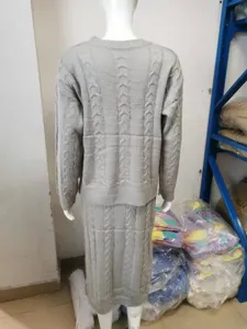 Grey cable knit sweater and skirt set, detailed back view showing texture and fit.