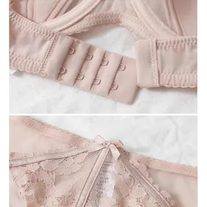 Pink lace lingerie set detail, soft bra back closure and cute bow panties feature.